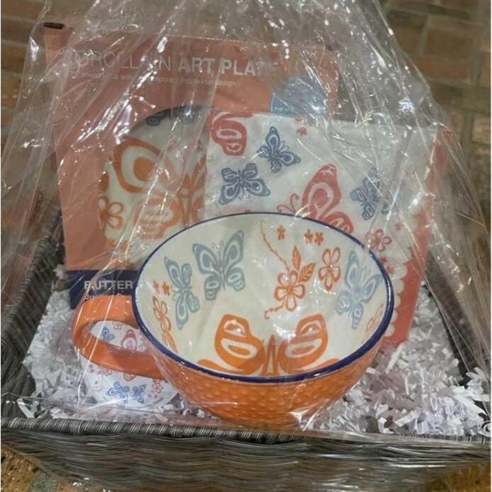 New gift basket includes porcelain mug, plate, napkins